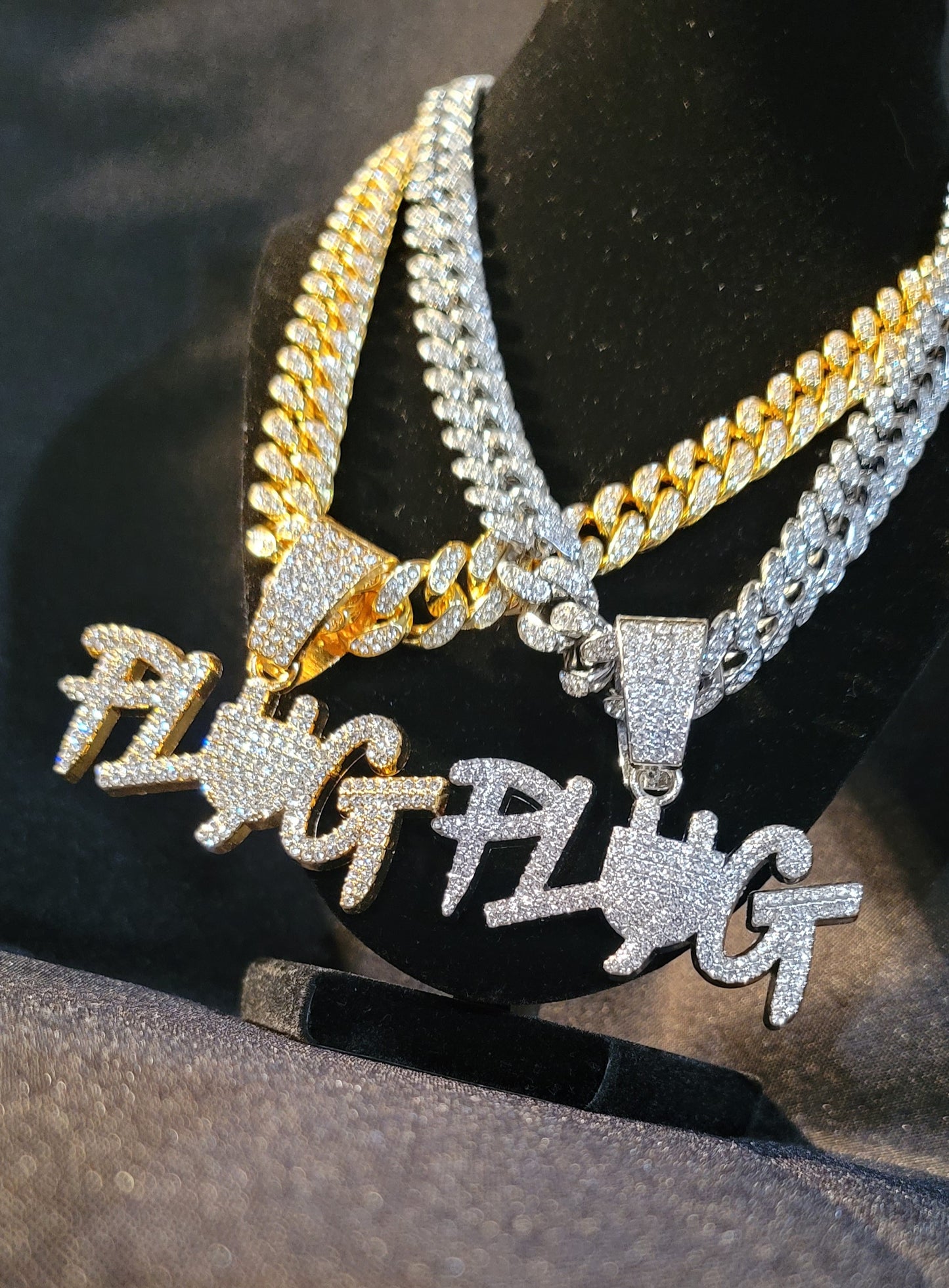 Plug pendant w/ iced out chain