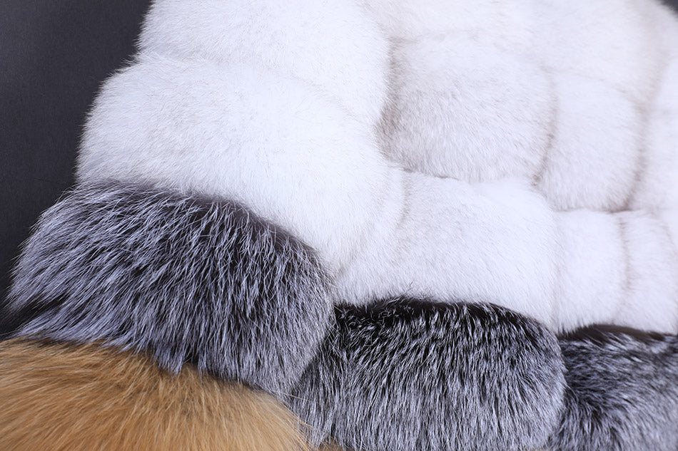 Close-up of fur with gray, white, and brown colors.