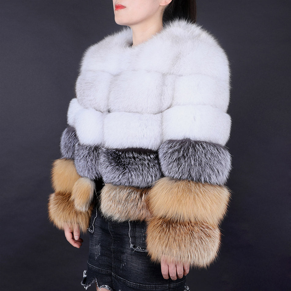 Fur coat with multicolored fur trim on a dark background