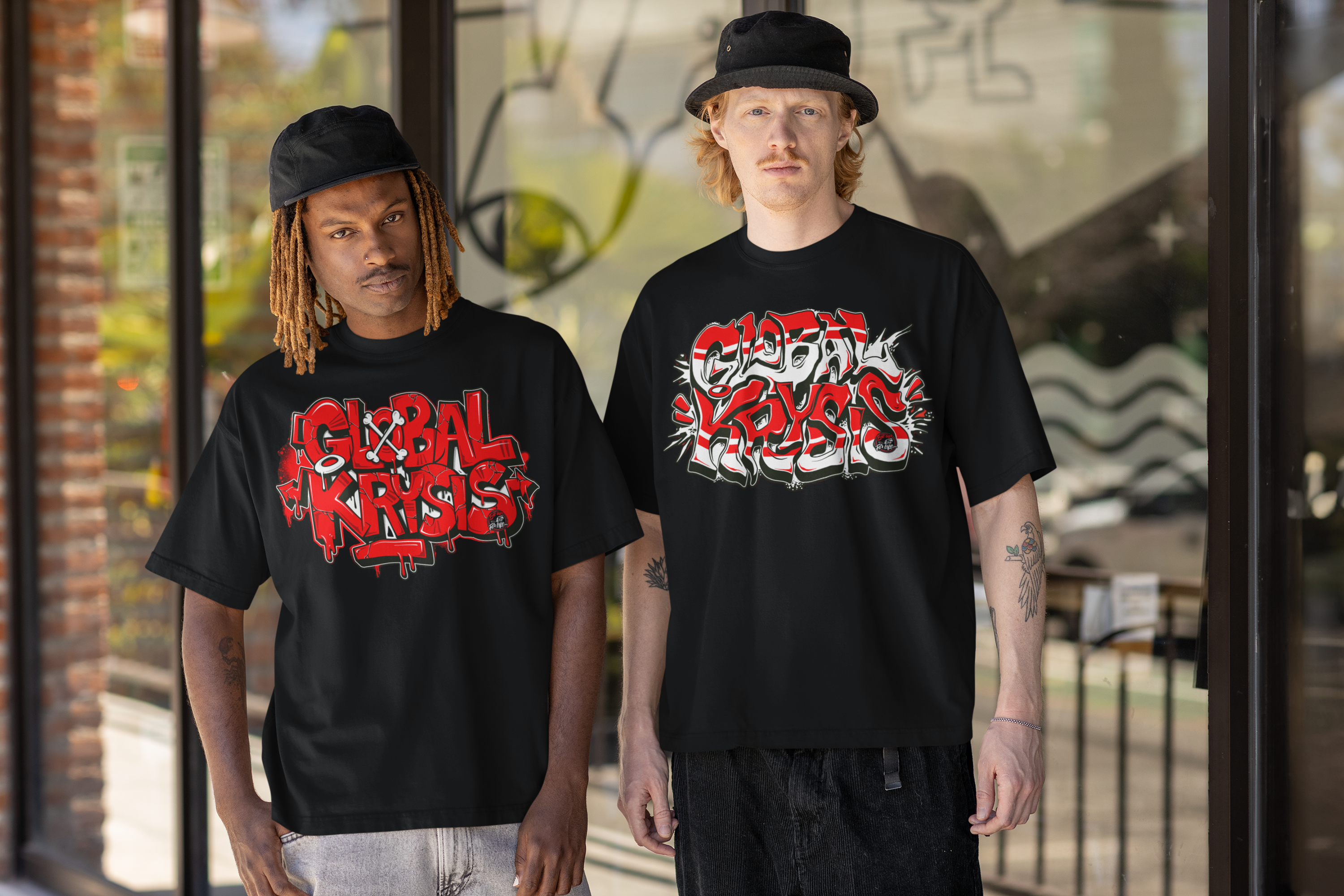 Two people wearing black t-shirts with red and white Global Crisis graphics in front of a glass door.